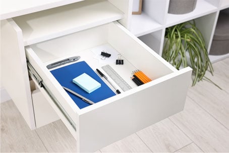 Soft close drawer runner in an office desk Soft close drawer runner in an office desk